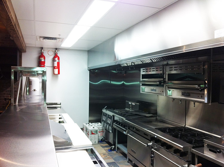 New Stainless Steel Professional Kitchen at Patron Tacos & Cantina by Paramount Projects General Contractors